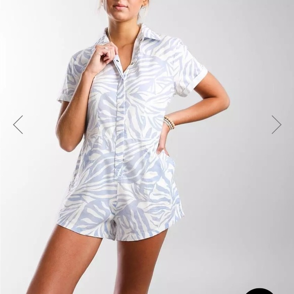 Brand new, never worn. Tags on. Palm print, snap front romper, cuffed sleeves. - Picture 2 of 9